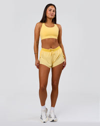 Woman wearing Fusion Sports Bra 2.0 - Lemon | Model:Bianca | Size:S | Thumbnail Index: 6