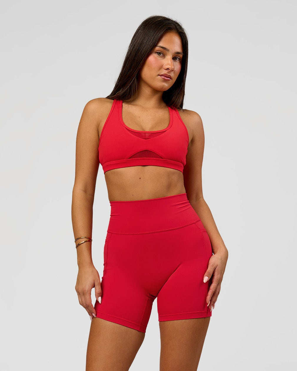 Woman wearing Fusion Ultra High-Rise 6" Short Pockets - Scarlet | Model:Bianca | Size:S - view 3