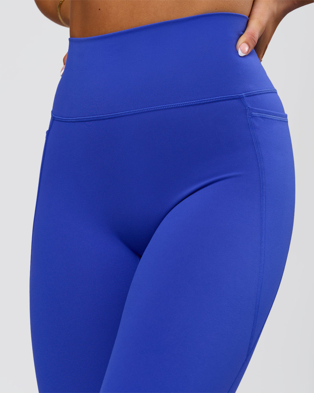 Woman wearing Fusion V-Contour Ultra High-Rise Full Length Legging Pockets - Power Cobalt | Model:Bianca | Size:S - view 5