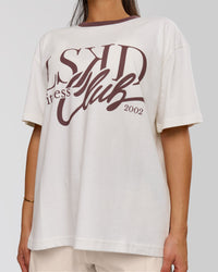 Woman wearing LSKD Fitness Club Heavyweight Oversized Tee - Off White-Cocoa Powder | Model:Bianca | Size:S | Thumbnail Index: 1