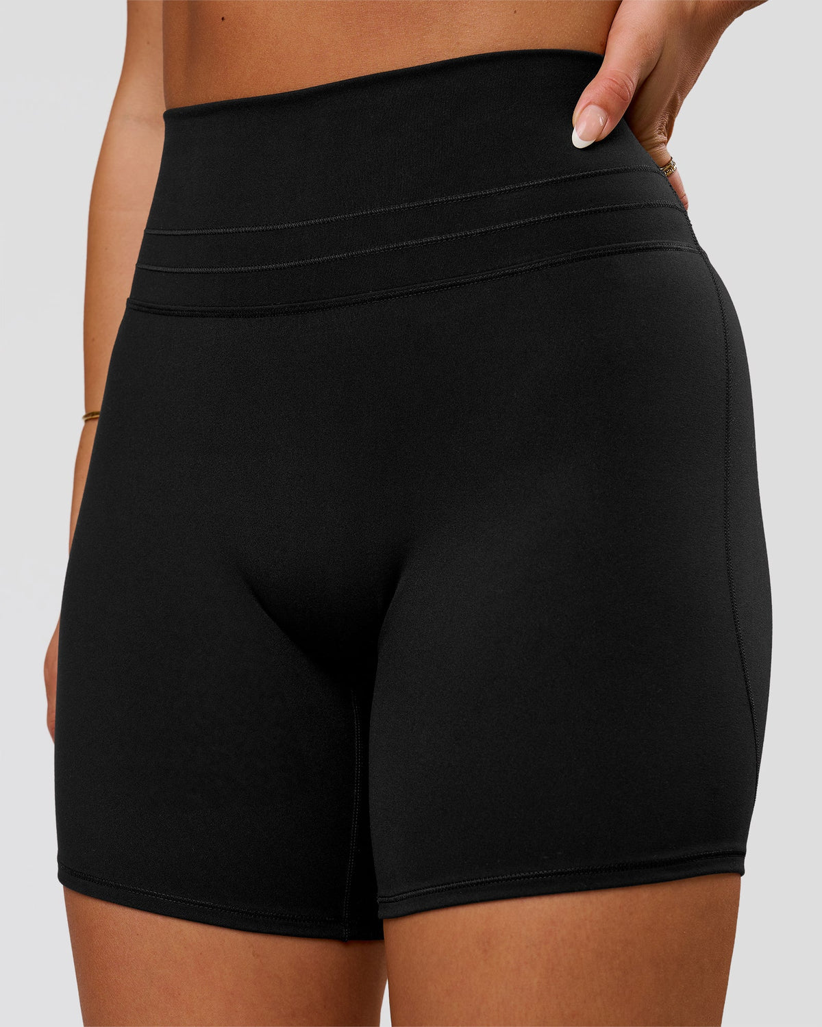 Woman wearing Luxe V-Contour High-Rise 6" Short - Black | Model:Bianca | Size:S - view 1