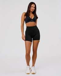 Woman wearing Luxe V-Contour High-Rise 6" Short - Black | Model:Bianca | Size:S | Thumbnail Index: 6