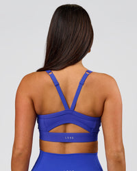 Woman wearing Momentum Sports Bra D/DD/E - Power Cobalt | Model:Bianca | Size:S | Thumbnail Index: 1