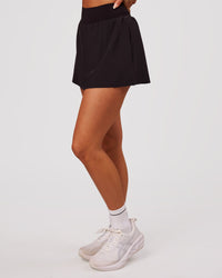 Woman wearing Pacer Skirt - Black | Model:Bianca | Size:S | Thumbnail Index: 7