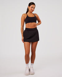 Woman wearing Pacer Skirt - Black | Model:Bianca | Size:S | Thumbnail Index: 8
