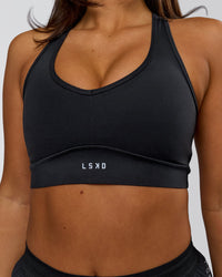 Woman wearing Stamina Amplify Sports Bra - Black | Model:Bianca | Size:S | Thumbnail Index: 0