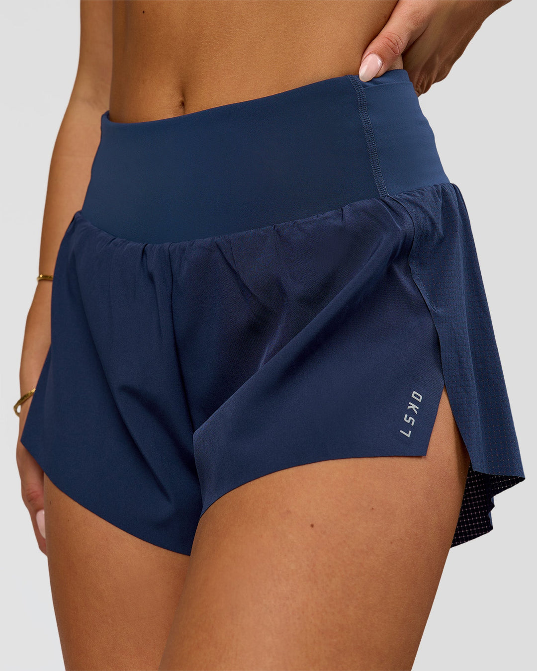 Woman wearing Tia-Clair Toomey-Orr Accelerate 3" Storage Running Short - Future Navy | Model:Bianca | Size:S - view 2