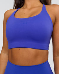 Woman wearing Twist Sports Bra D/DD/E - Power Cobalt | Model:Bianca | Size:S | Thumbnail Index: 2