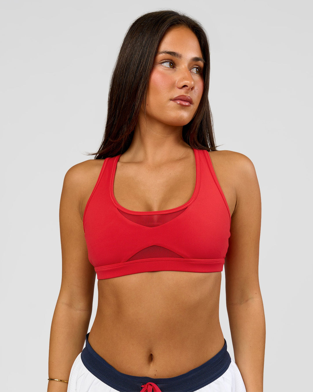 Woman wearing Unstoppable Racerback Sports Bra - Scarlet | Model:Bianca | Size:S - view 12