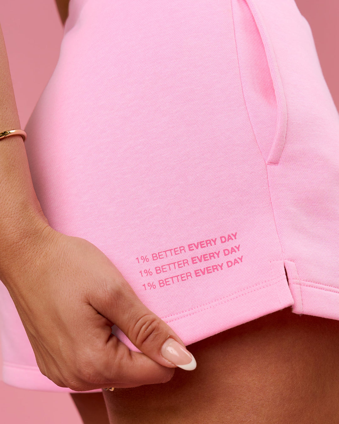 Woman wearing We Rise Shorts  - Pink Rose-We Rise | Model:Bianca | Size:S - view 12