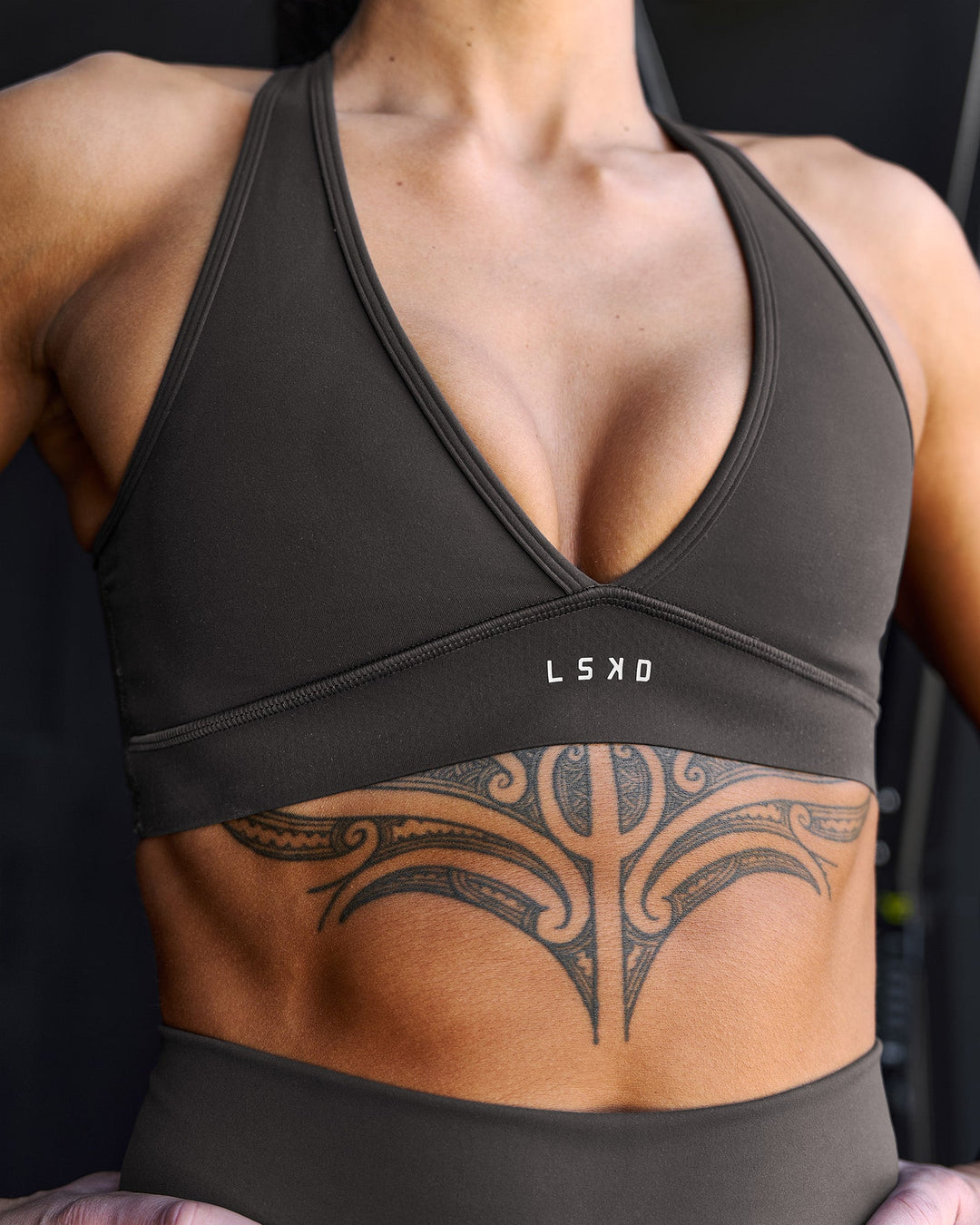 Woman wearing Stamina Sports Bra - Onyx | Model:Chelsea | Size:S - view 6