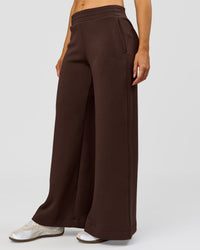 Woman wearing Elevate SoftTouch Wide Leg Pant - Hot Chocolate | Model:Claire | Size:S | Thumbnail Index: 0