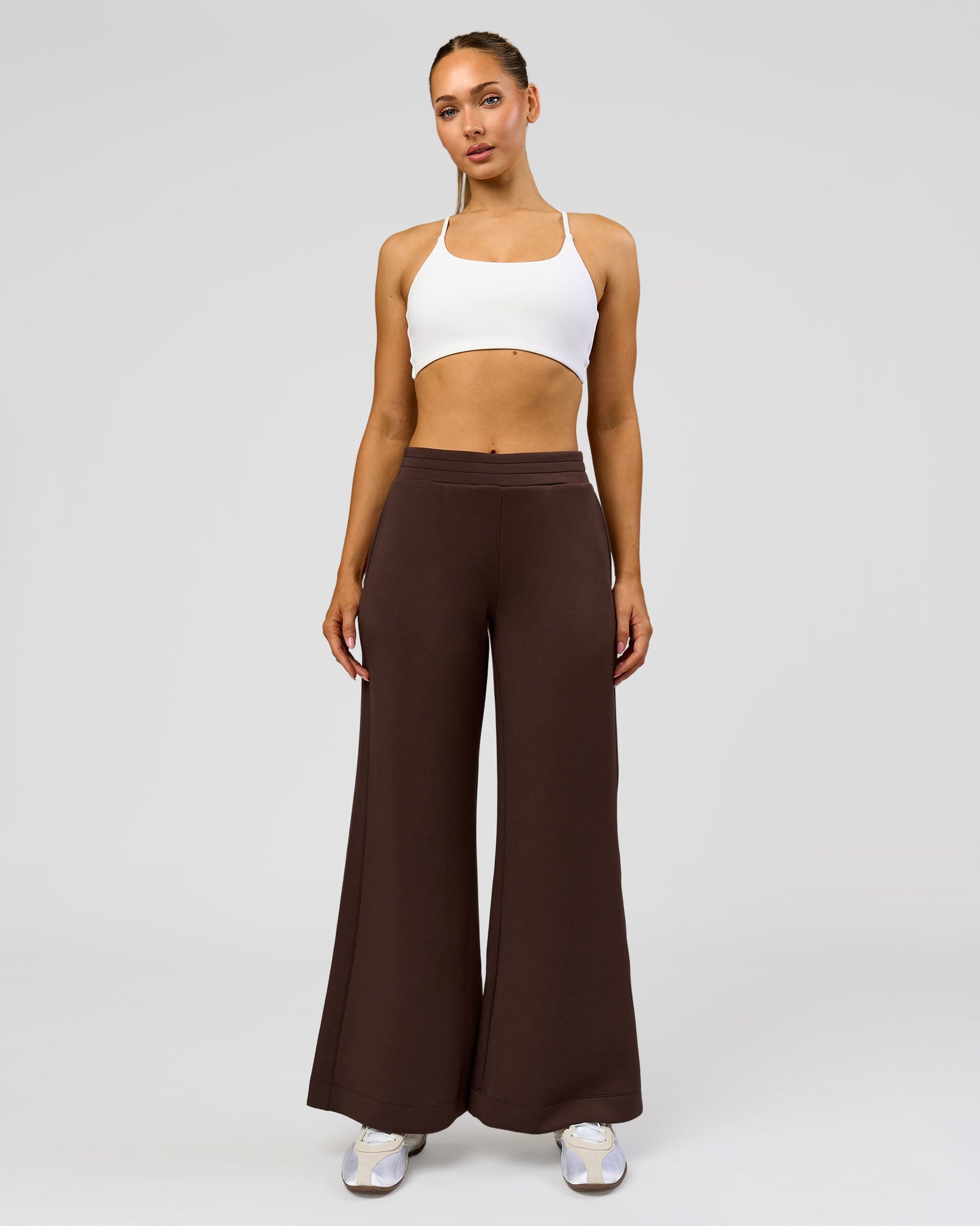 Woman wearing Elevate SoftTouch Wide Leg Pant - Hot Chocolate | Model:Claire | Size:S