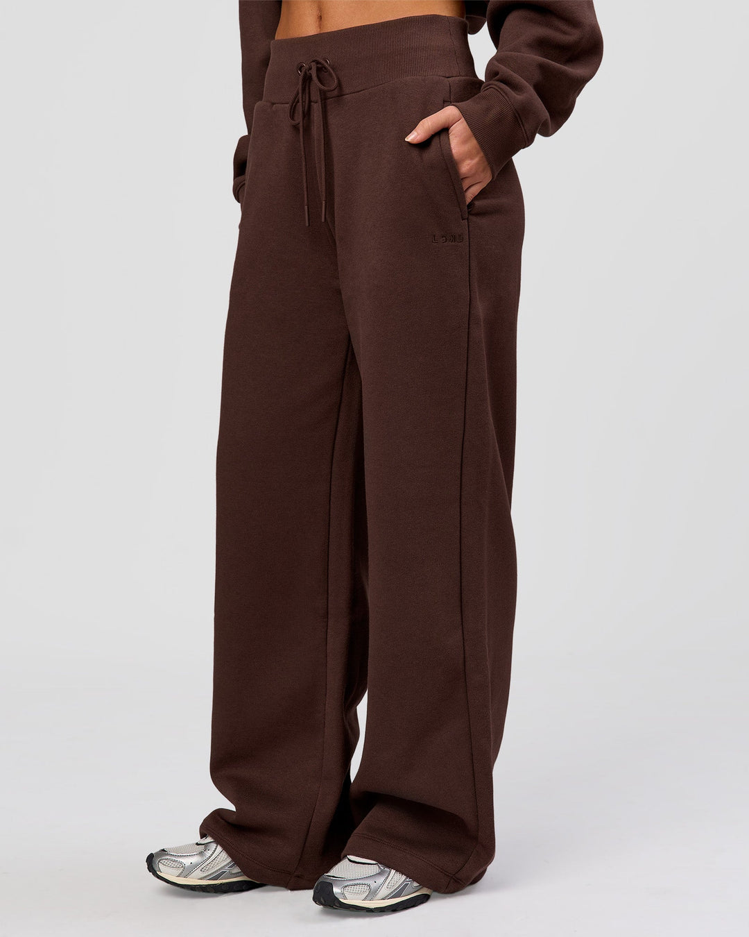 Woman wearing Go-To Wide Leg Track Pant - Hot Chocolate | Model:Issy | Size:S