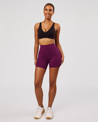 Woman wearing Elixir High-Rise 6" Short Pockets - Plum Caspia | Model:Jordan | Size:S | Thumbnail Index: 3