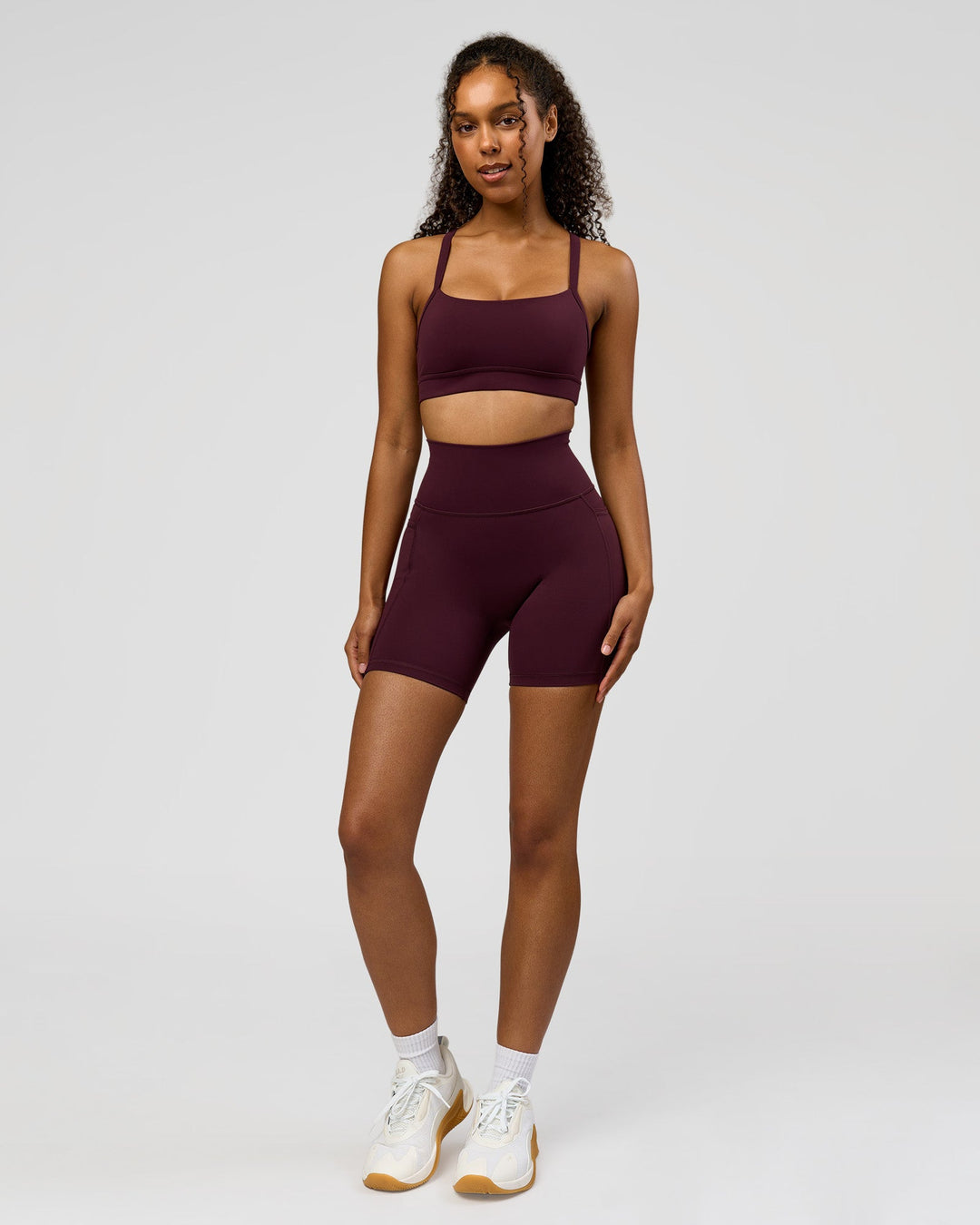 Woman wearing Fusion Ultra High-Rise 6" Short Pockets - Cherry Lacquer | Model:Jordan | Size:S - view 6