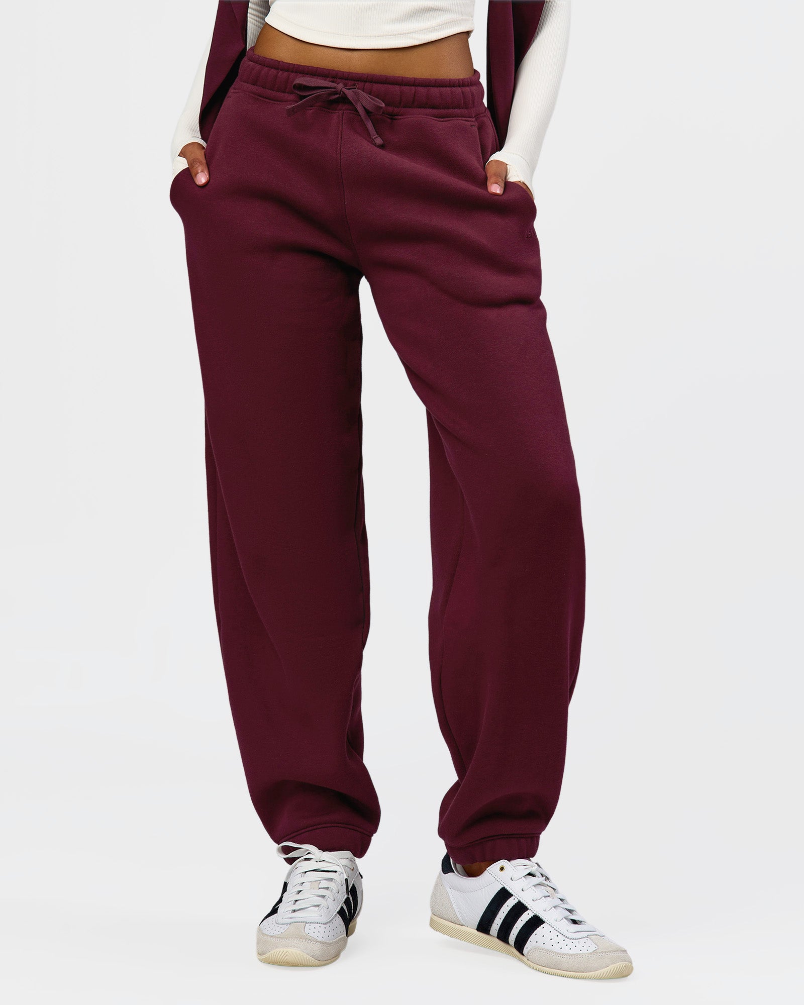 Woman wearing Go-To Oversized Track Pant - Cherry Lacquer | Model:Jordan | Size:S