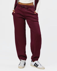 Woman wearing Go-To Oversized Track Pant - Cherry Lacquer | Model:Jordan | Size:S | Thumbnail Index: 0