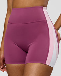 Woman wearing Revitalise Ultra High-Rise 4" Short - Boysenberry - Pink Rose | Model:Jordan | Size:S | Thumbnail Index: 0