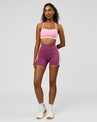 Woman wearing Revitalise Ultra High-Rise 4" Short - Boysenberry - Pink Rose | Model:Jordan | Size:S | Thumbnail Index: 5