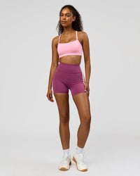 Woman wearing Revitalise Ultra High-Rise 4" Short - Boysenberry - Pink Rose | Model:Jordan | Size:S | Thumbnail Index: 6