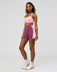 Woman wearing Revitalise Ultra High-Rise 4" Short - Boysenberry - Pink Rose | Model:Jordan | Size:S | Thumbnail Index: 4