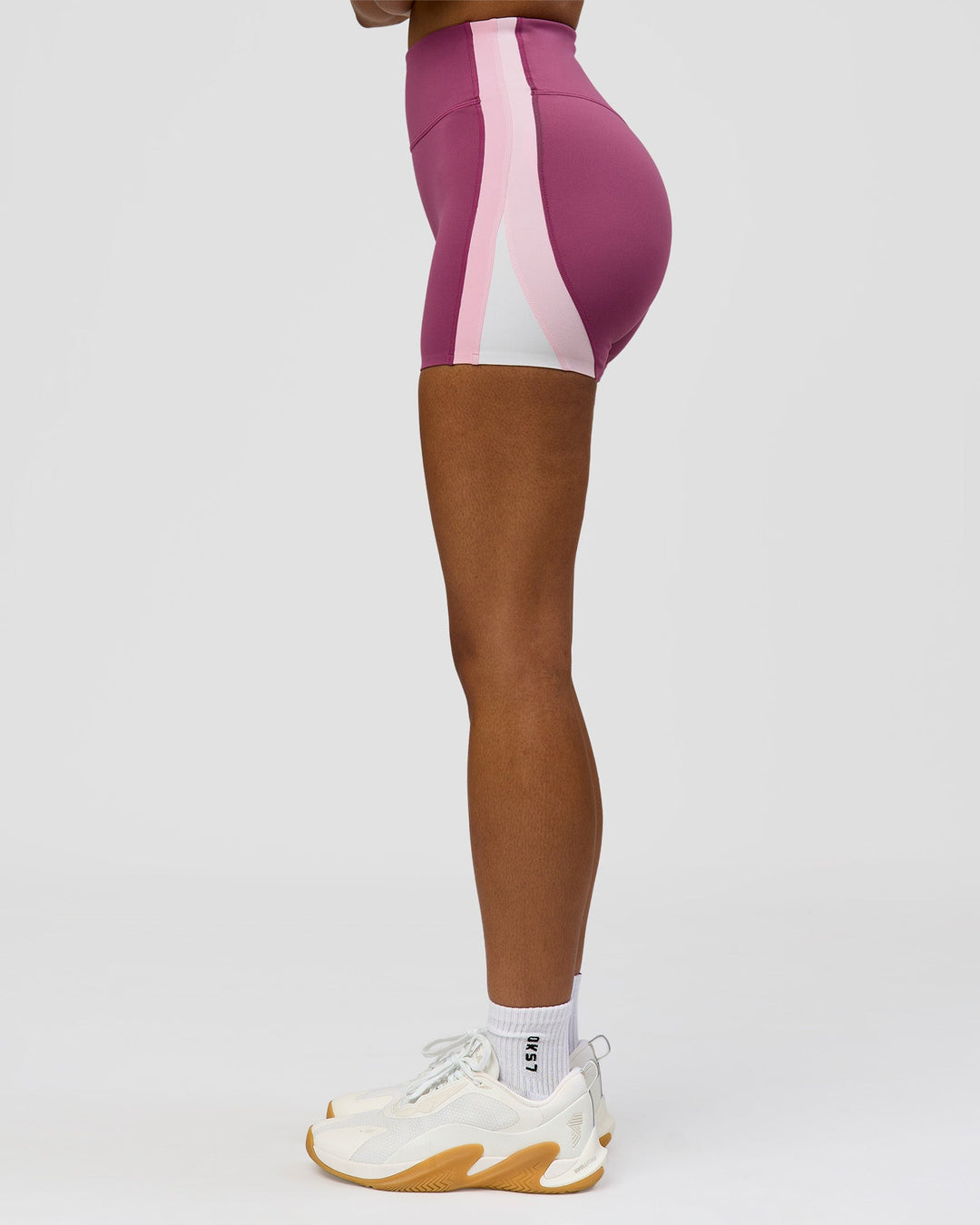 Woman wearing Revitalise Ultra High-Rise 4" Short - Boysenberry - Pink Rose | Model:Jordan | Size:S - view 8