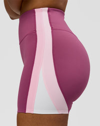 Woman wearing Revitalise Ultra High-Rise 4" Short - Boysenberry - Pink Rose | Model:Jordan | Size:S | Thumbnail Index: 8