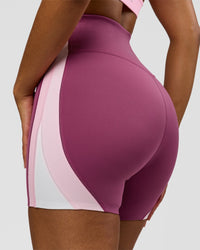Woman wearing Revitalise Ultra High-Rise 4" Short - Boysenberry - Pink Rose | Model:Jordan | Size:S | Thumbnail Index: 12