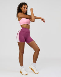 Woman wearing Revitalise Ultra High-Rise 4" Short - Boysenberry - Pink Rose | Model:Jordan | Size:S | Thumbnail Index: 11