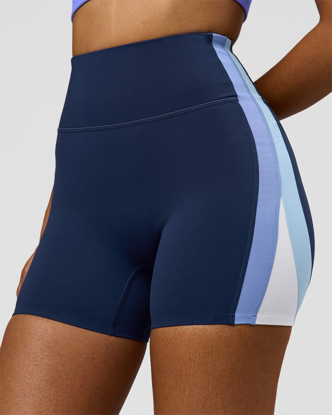 Woman wearing Revitalise Ultra High-Rise 4" Short - Future Navy - Bluebell | Model:Jordan | Size:S - view 1