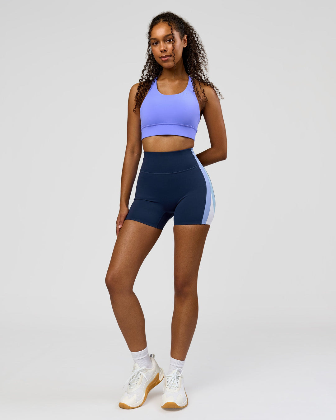 Woman wearing Revitalise Ultra High-Rise 4" Short - Future Navy - Bluebell | Model:Jordan | Size:S - view 6