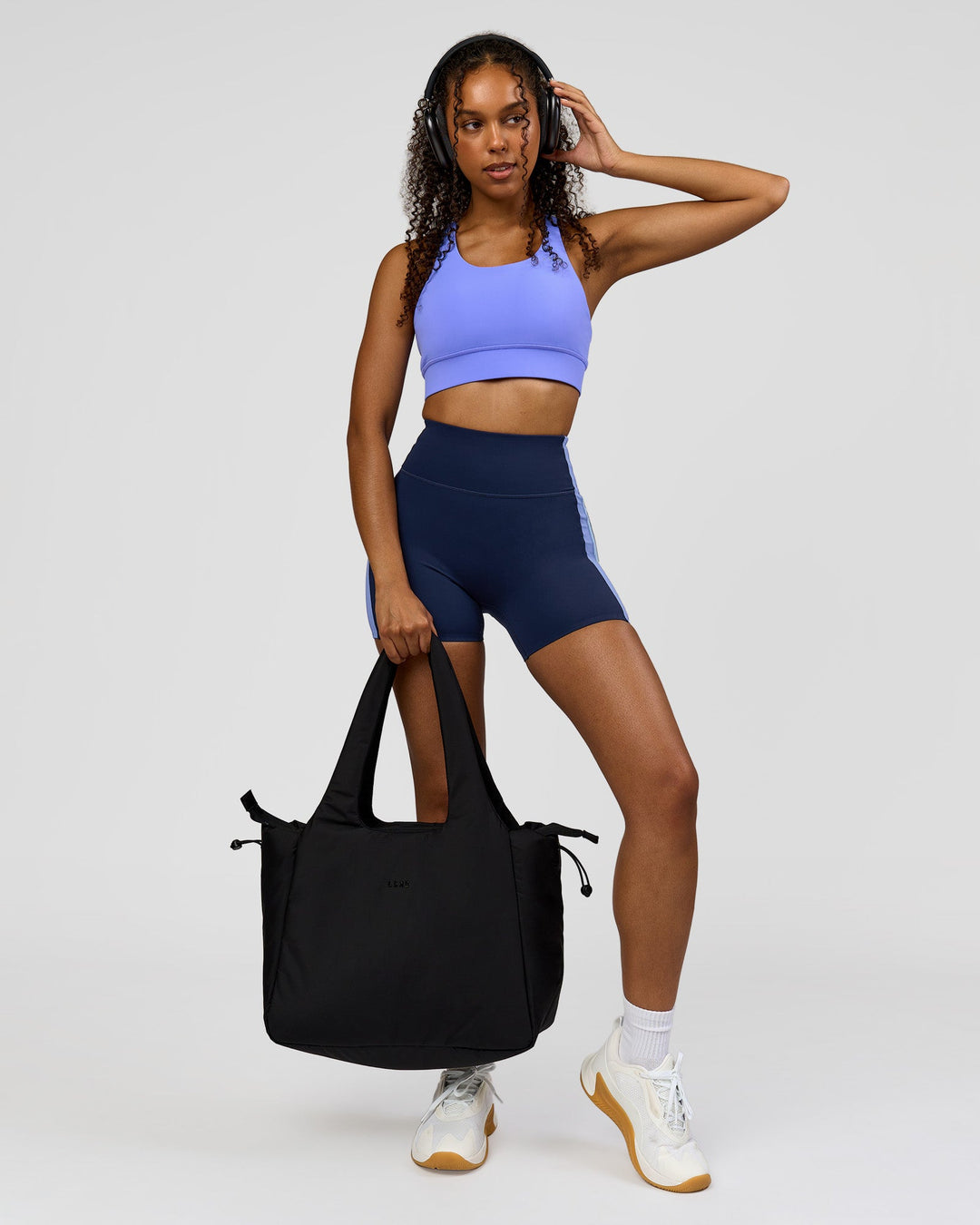 Woman wearing Revitalise Ultra High-Rise 4" Short - Future Navy - Bluebell | Model:Jordan | Size:S - view 5