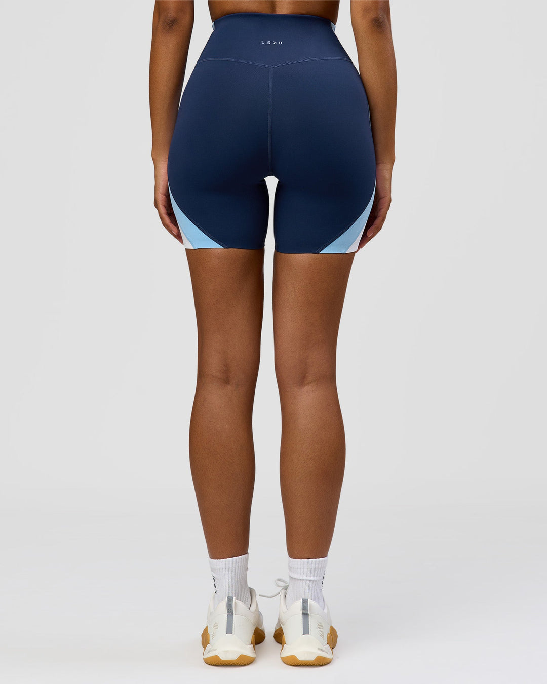 Woman wearing Revitalise Ultra High-Rise 6" Short - Future Navy-Bluebell | Model:Jordan | Size:S - view 6