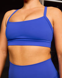 Woman wearing Momentum Sports Bra - Power Cobalt | Model:Libby | Size:S | Thumbnail Index: 7