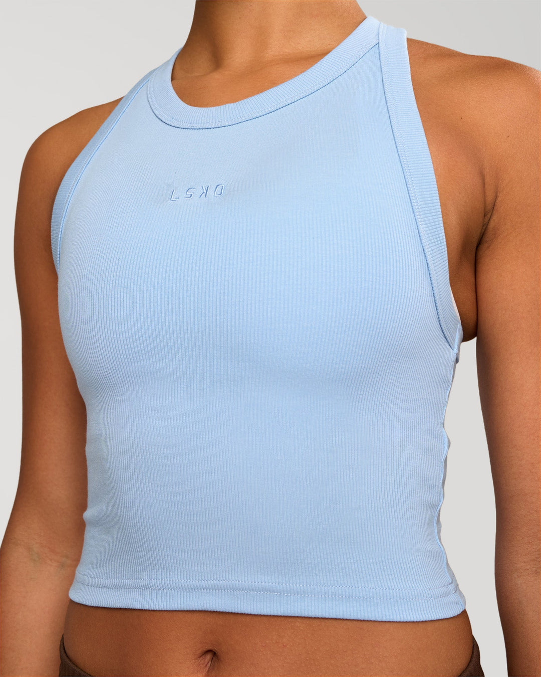 Woman wearing Go-To FLXCotton Rib Crop Tank - Open Air | Model:Rosie | Size:S - view 2