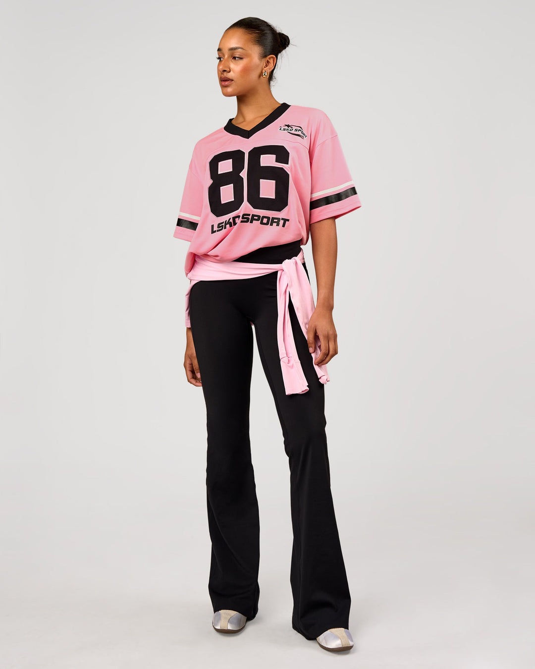 Woman wearing Playmaker V-Neck Jersey - Pink Rose-Black | Model:Rosie | Size:S - view 5