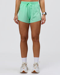 Woman wearing Accelerate 3" High-Rise Running Short - Jelly Mint | Model:Summer | Size:S | Thumbnail Index: 4