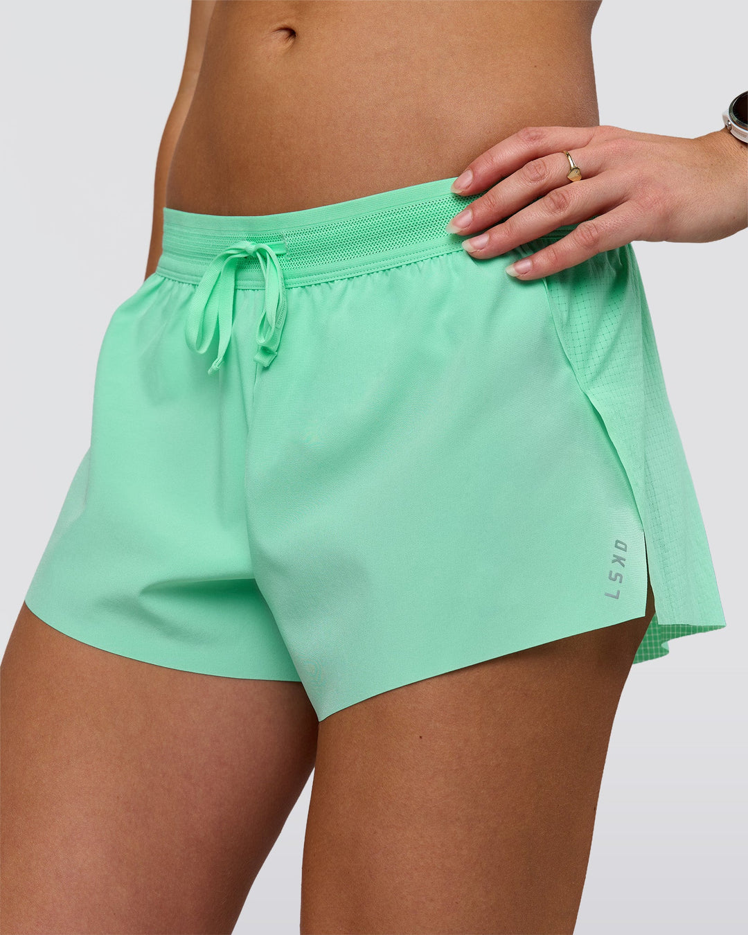Woman wearing Accelerate 3" Mid-Rise Running Short - Jelly Mint | Model:Summer | Size:S - view 1
