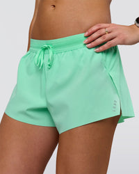 Woman wearing Accelerate 3" Mid-Rise Running Short - Jelly Mint | Model:Summer | Size:S | Thumbnail Index: 0