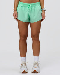 Woman wearing Accelerate 3" Mid-Rise Running Short - Jelly Mint | Model:Summer | Size:S | Thumbnail Index: 2