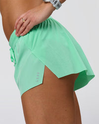 Woman wearing Accelerate 3" Mid-Rise Running Short - Jelly Mint | Model:Summer | Size:S | Thumbnail Index: 6