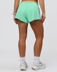 Woman wearing Accelerate 3" Mid-Rise Running Short - Jelly Mint | Model:Summer | Size:S | Thumbnail Index: 8