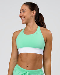 Woman wearing Accelerate Sports Bra - Jelly Mint-White | Model:Summer | Size:S | Thumbnail Index: 0