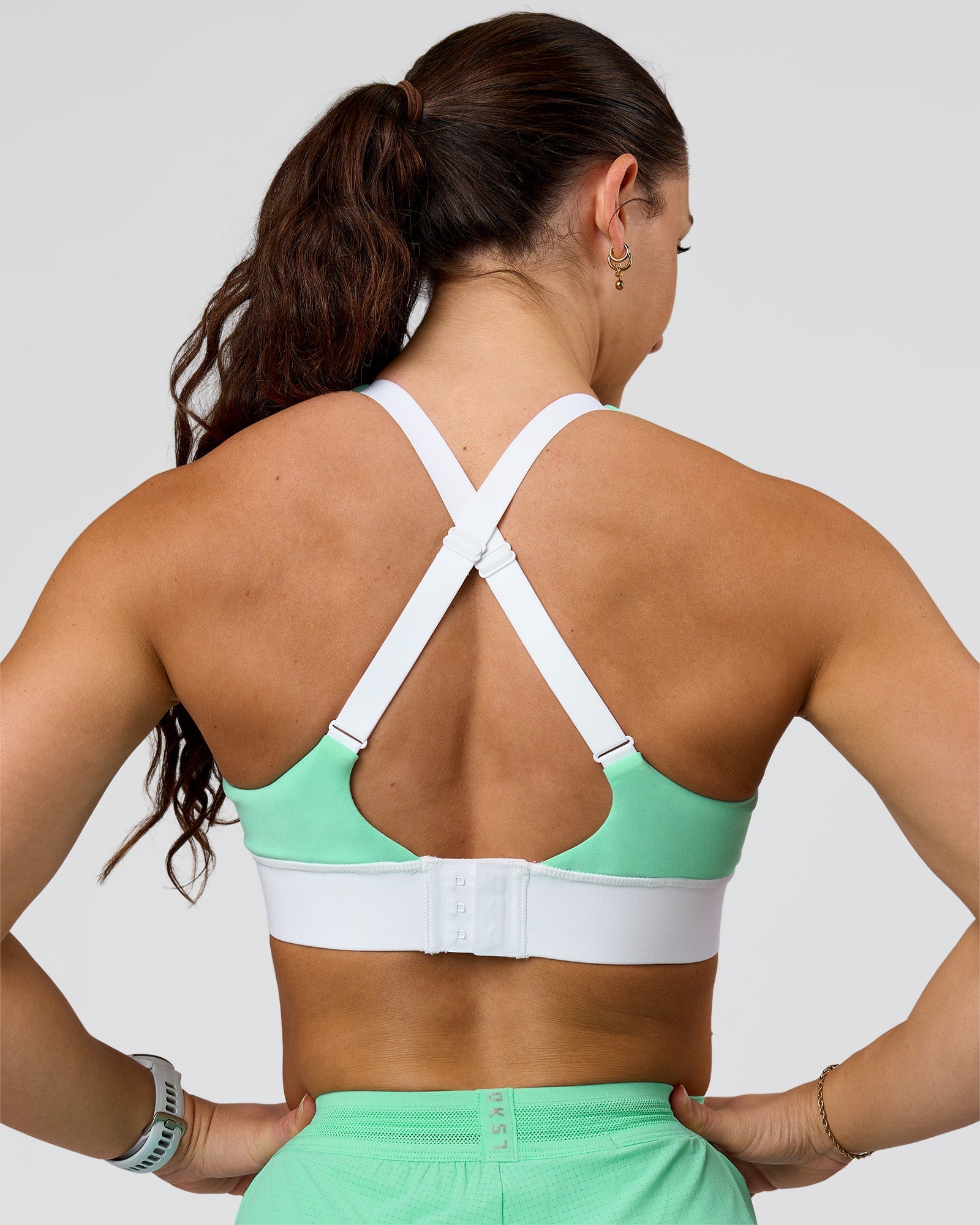 Woman wearing Accelerate Sports Bra - Jelly Mint-White | Model:Summer | Size:S