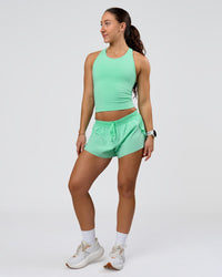 Woman wearing Flow Performance Tank 2.0 - Jelly Mint | Model:Summer | Size:S | Thumbnail Index: 2
