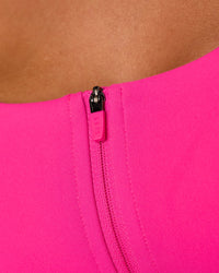 Woman wearing Empowered Sports Bra - Ultra Pink | Model:Tianah | Size:S | Thumbnail Index: 9