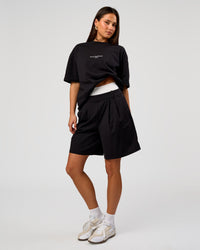 Woman wearing Andrew J. Steel x LSKD Heavyweight Boxed Tee - Black | Model:Bianca | Size:XS | Thumbnail Index: 8