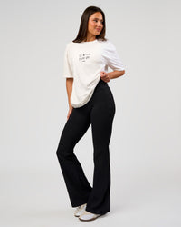 Woman wearing Andrew J. Steel x LSKD Heavyweight FLXCotton Oversized Tee - White | Model:Bianca | Size:XS | Thumbnail Index: 7