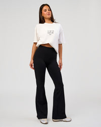 Woman wearing Andrew J. Steel x LSKD Heavyweight FLXCotton Oversized Tee - White | Model:Bianca | Size:XS | Thumbnail Index: 11